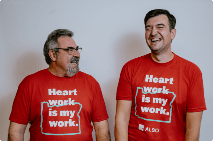 two-also-employees-pose-laughing